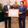 Dr Jonathan Choi received the Friendship order from Deputy Minister, Mr Pham Binh Minh